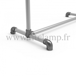 Stop-trottoir pour bâche tendue en structure tubulaire. Piètement raccord tubulaire coude 90°. Détaille