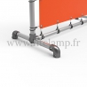 Pavement display frame with tension banner on aluminium tubular structure. Detail of tube clamp fitting 125. FitClamp.