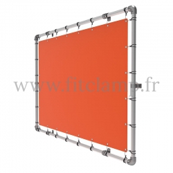 Wall mounted display frame with tension banner on aluminium tubular structure. FitClamp.