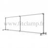 Upright display frame for tension banner on aluminium tubular structure. With tube of reinforcement. FitClamp.